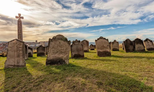 an image of a peaceful cemetery and headstones  